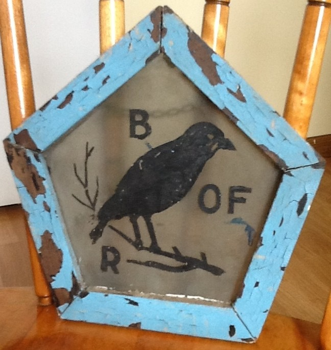 Original Brotherhood of Rooks emblem imbedded in the Rook house fireplace